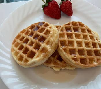 Reviewer photo of waffles on a plate with strawberries