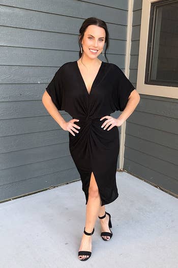 another reviewer wearing the black dress