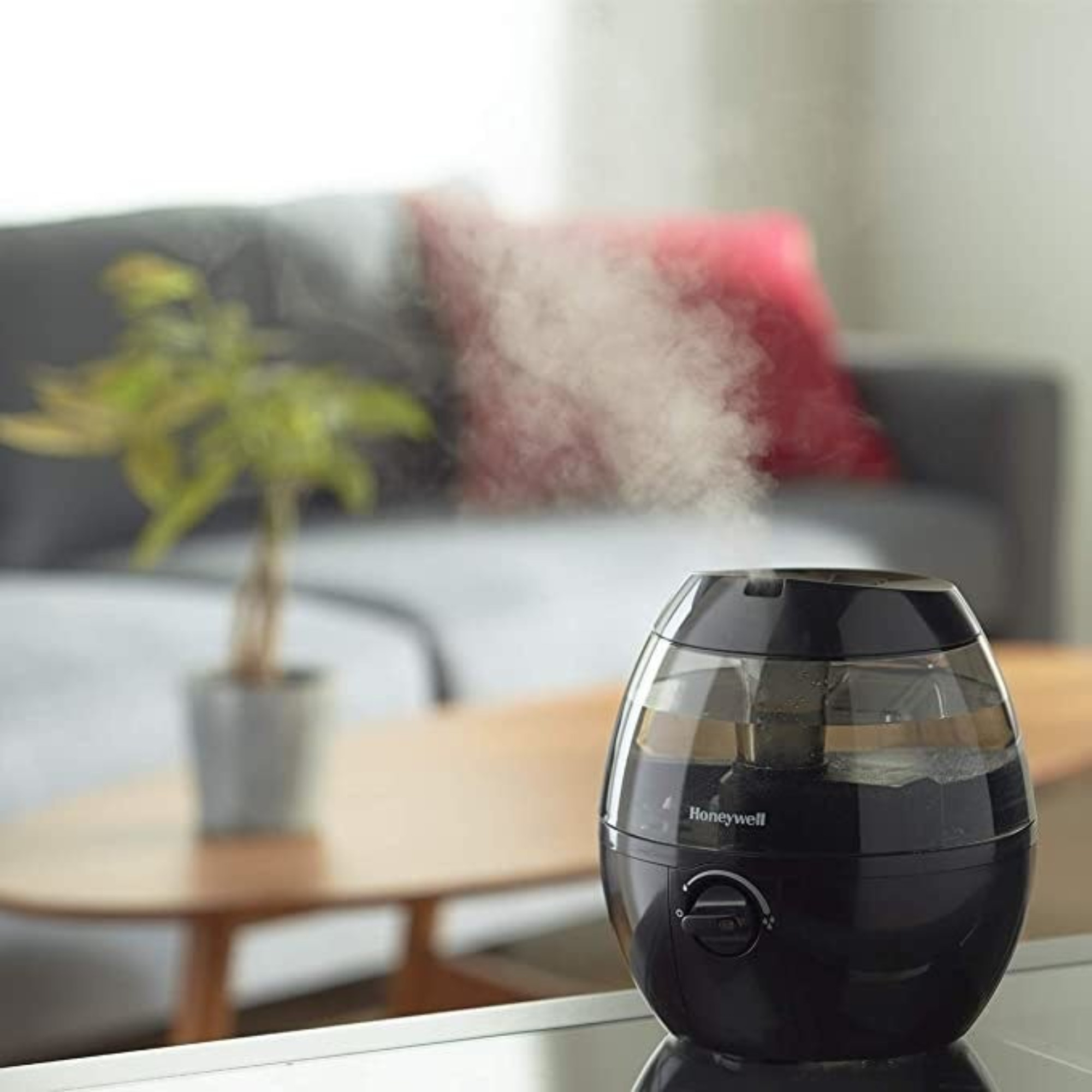 A humidifier on a table in a room