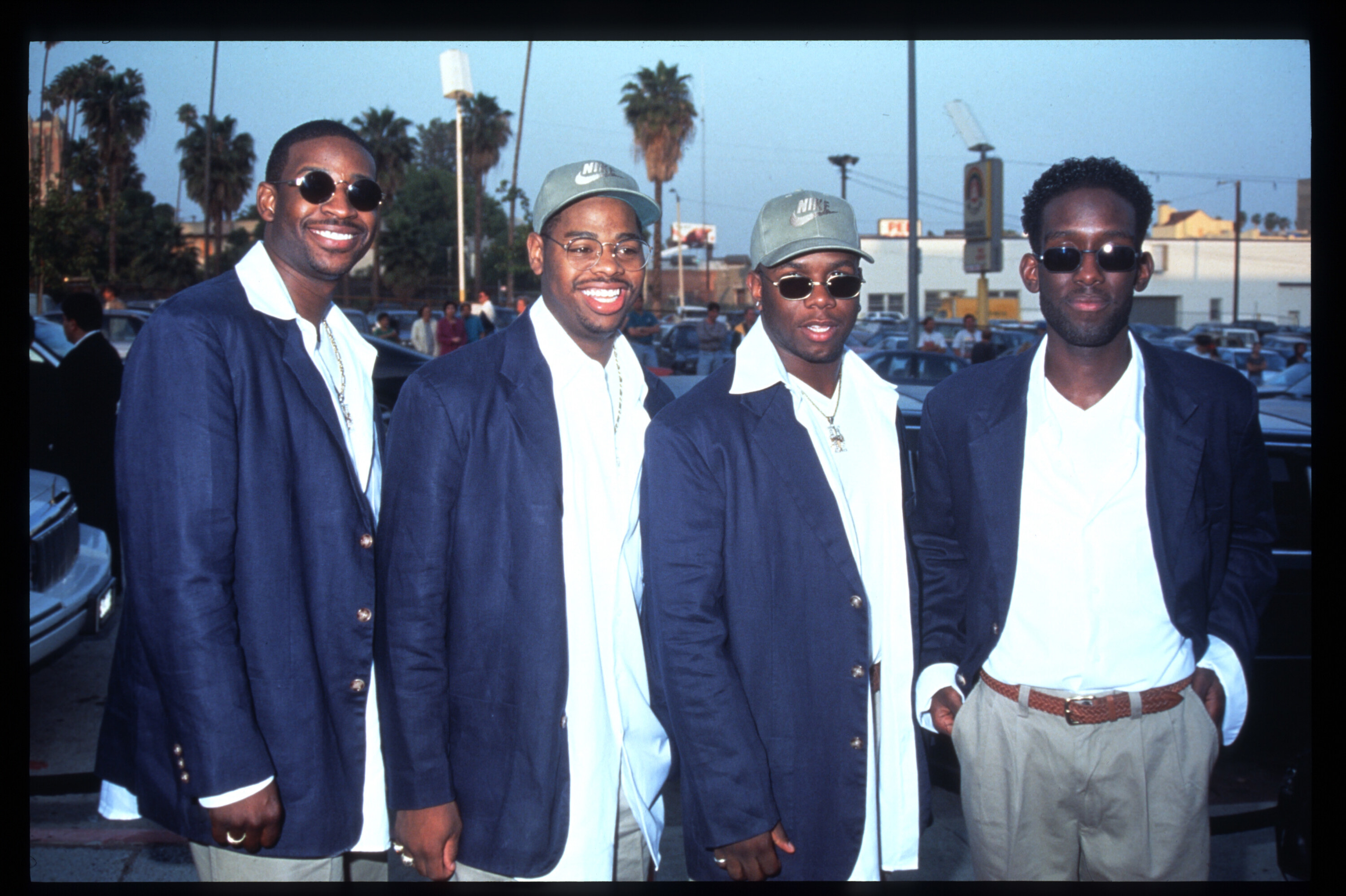 Boys II Men pose for a photo