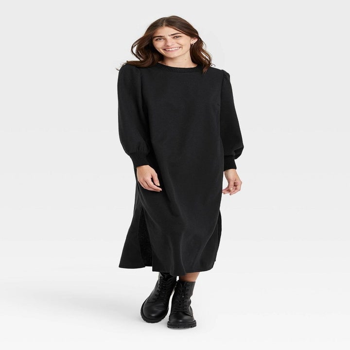 model in the basic black long sleeve dress