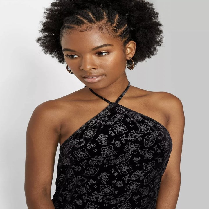 front view of model wearing the of the model wearing the dress in black paisley