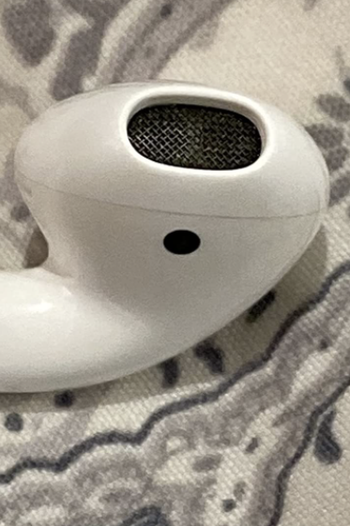 the same AirPod with now clean speaker