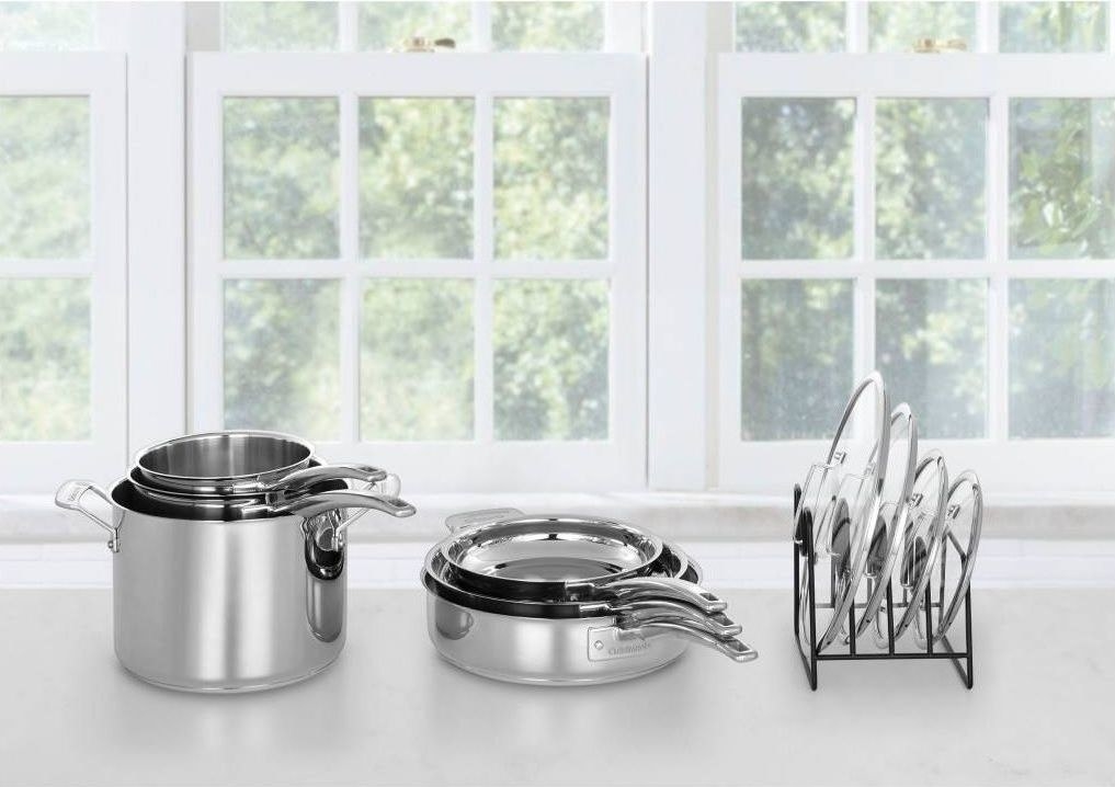 The stainless steel cookware set on a countertop