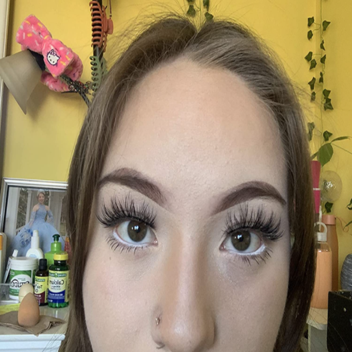 reviewer wearing white eyeliner on lower lash line
