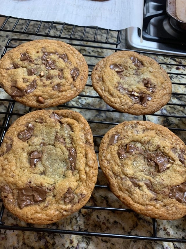 Chocolate chip cookies with caramel and pretzel bits.