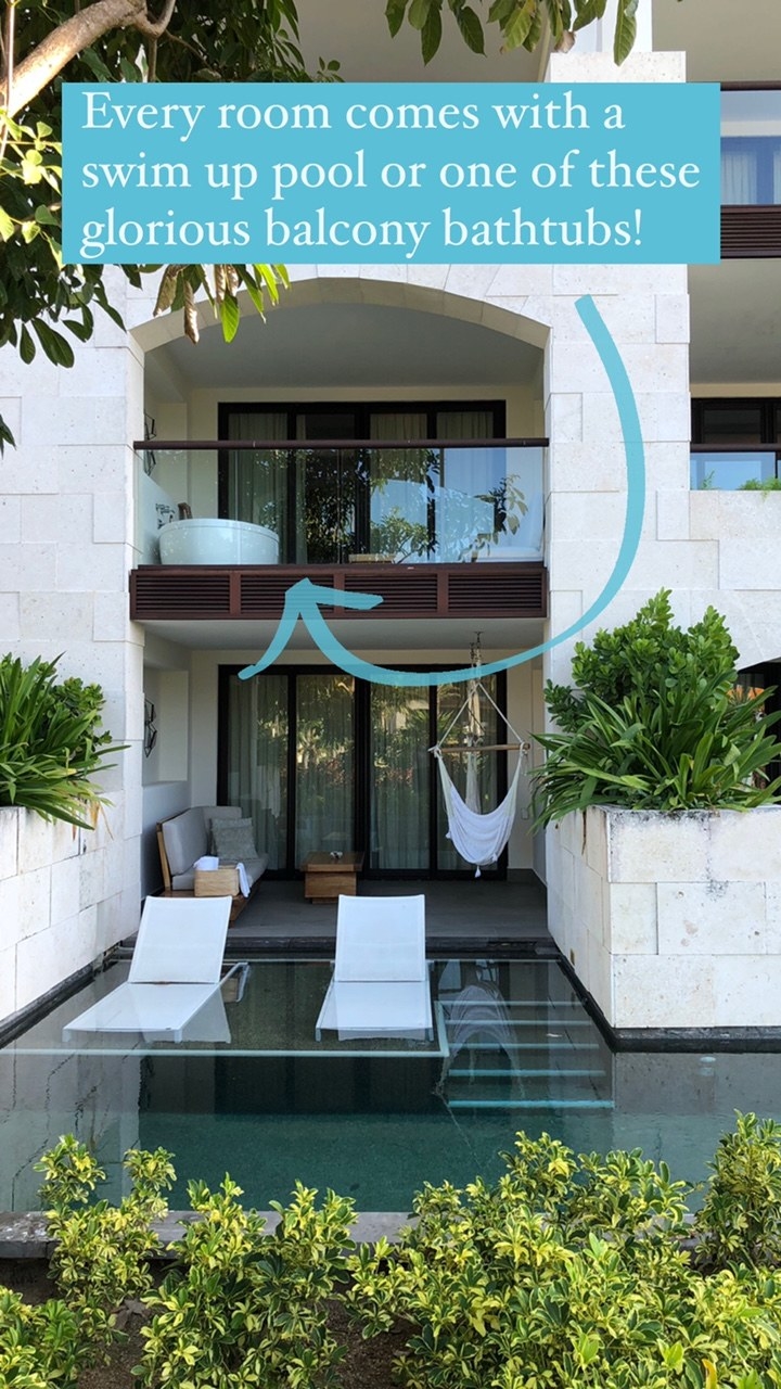 Outside the rooms at Unico, showing a balcony and patio, outdoor furniture, full-length windows, and stairs descending into the pool