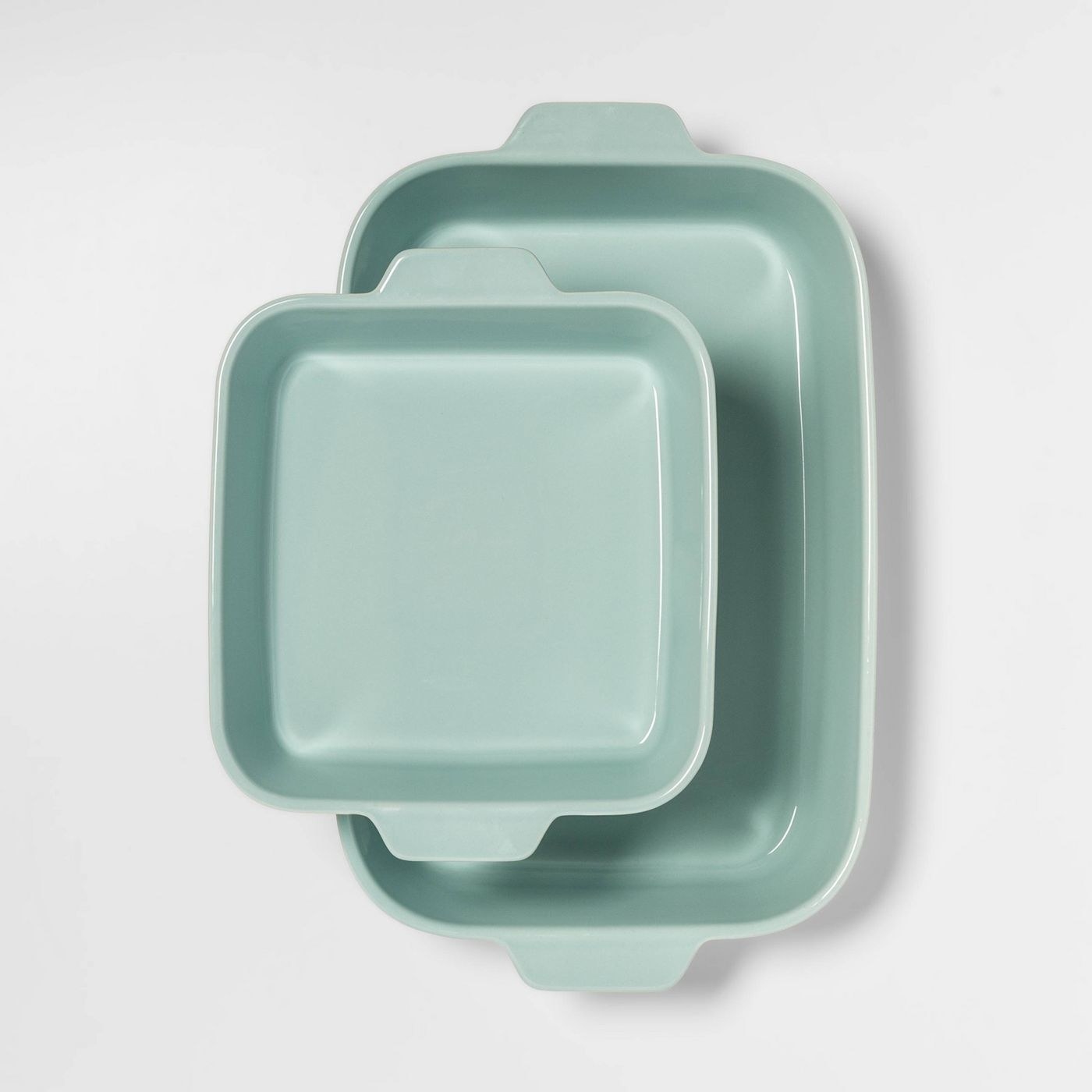 The two rectagular baking dishes in a light aqua color