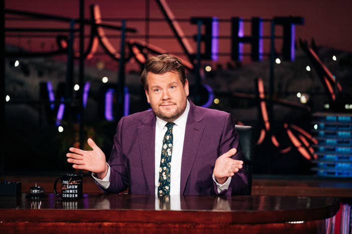 James shrugging at his late night talk show desk