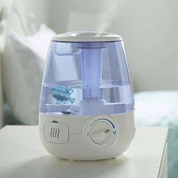A humidifier with the fish shaped cleaner floating inside