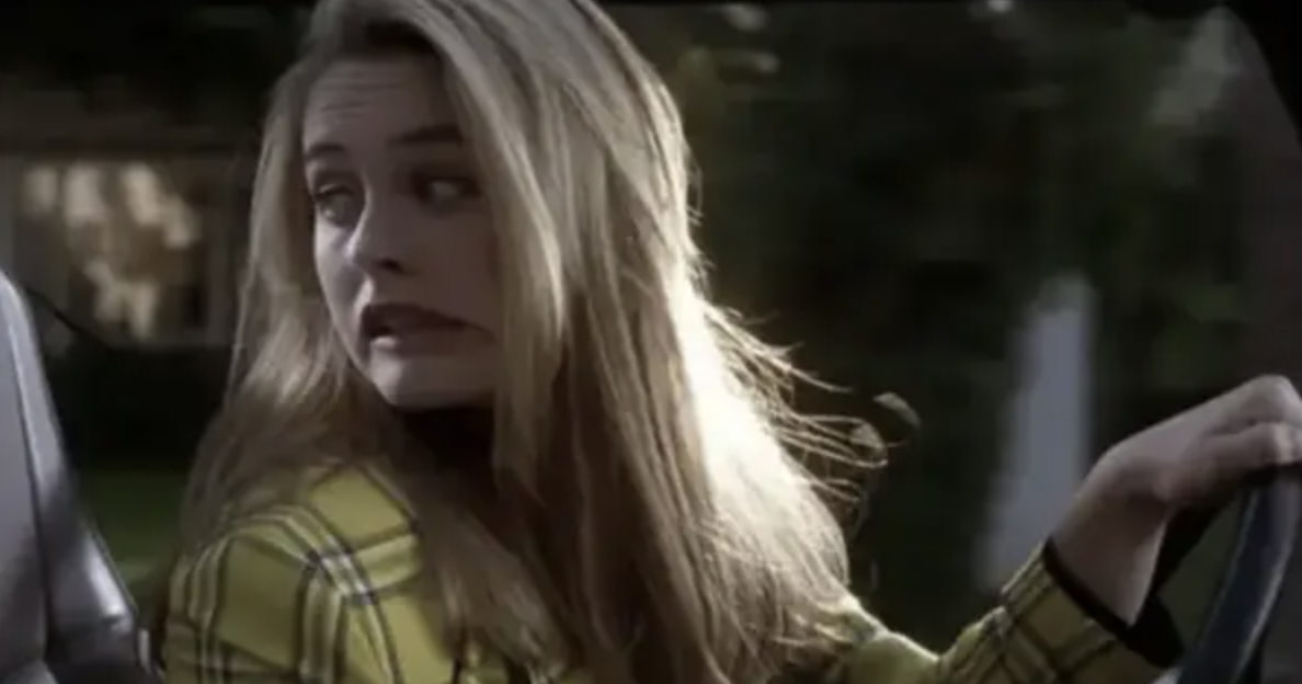 Alicia Silverstone grimacing