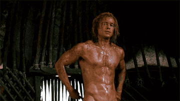 Achilles flexing his abs and looking fine