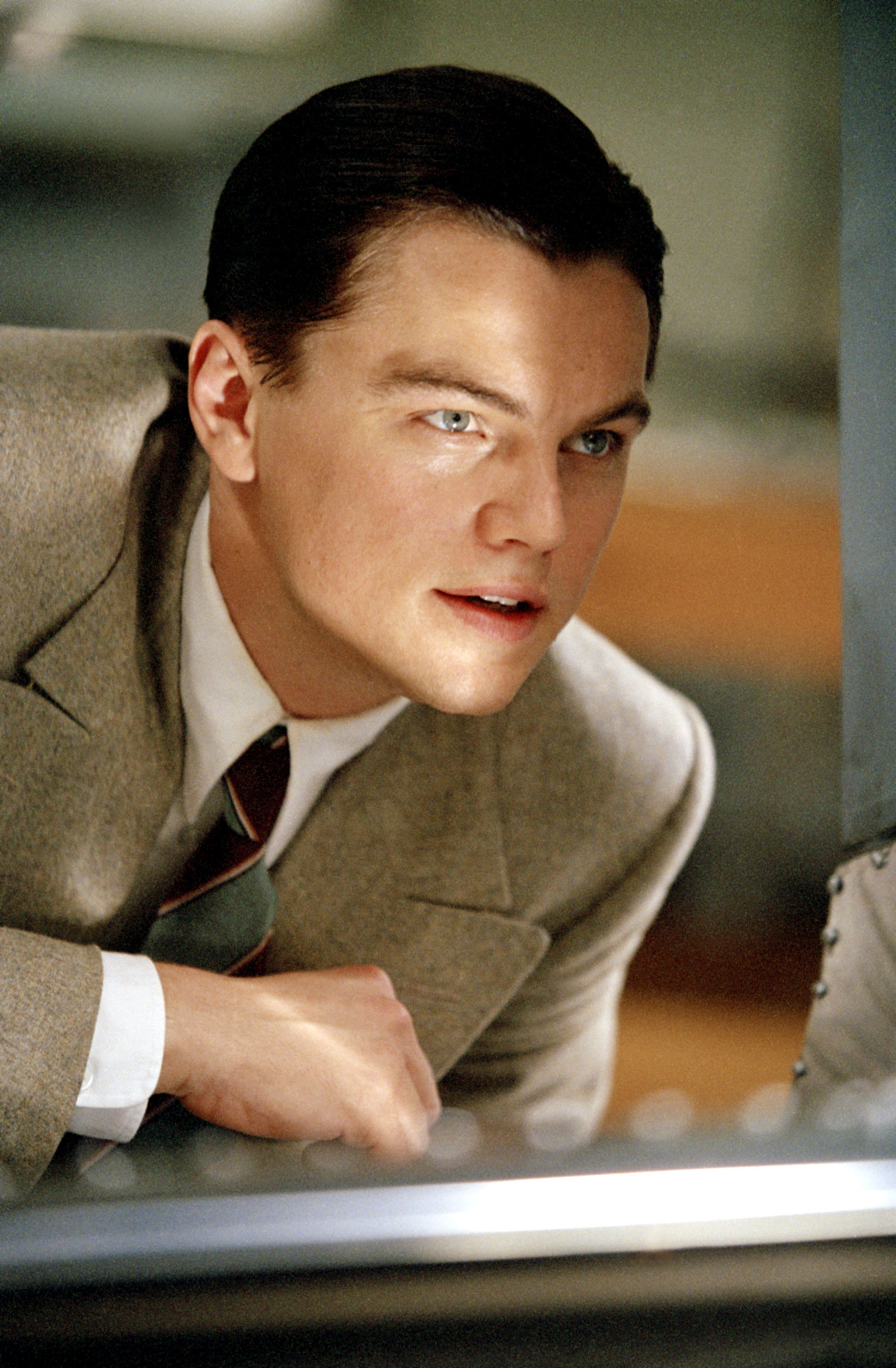 DiCaprio wearing a suit and tie