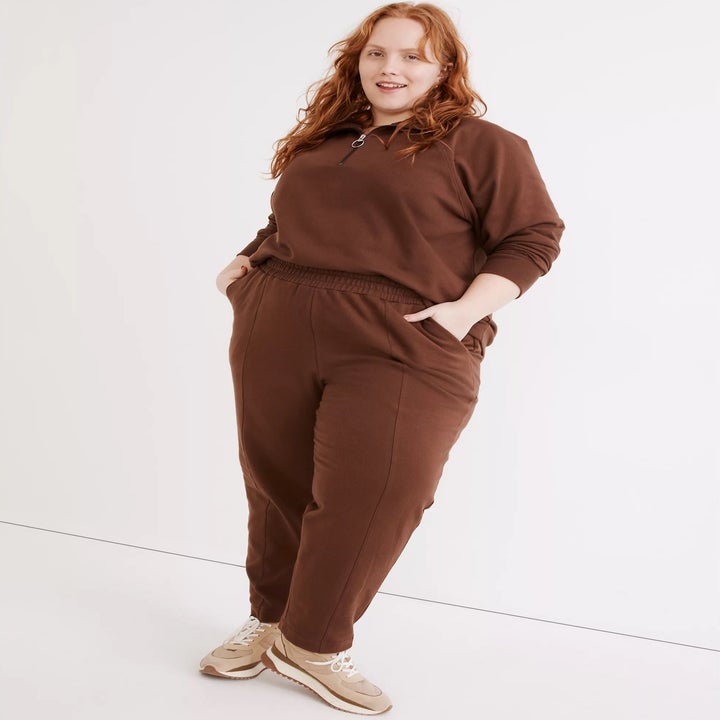 model wearing the brown ribbed sweatpants