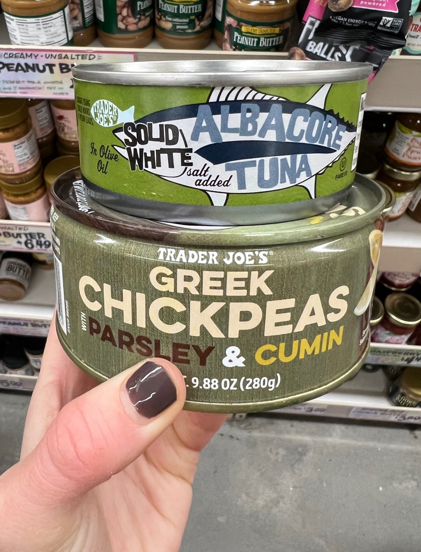 A can of tuna fish and a can of chickpeas.