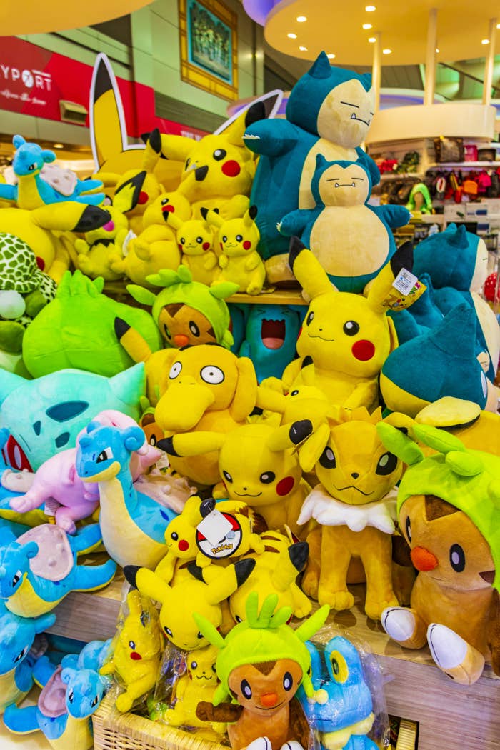 A pile of colorful plush Pokémon toys