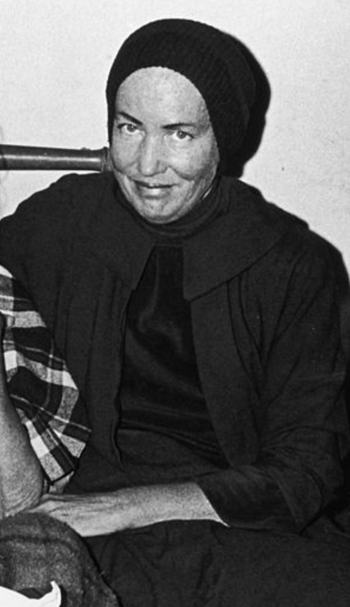 Bouvier Beale wearing a black headscarf at her home in East Hampton