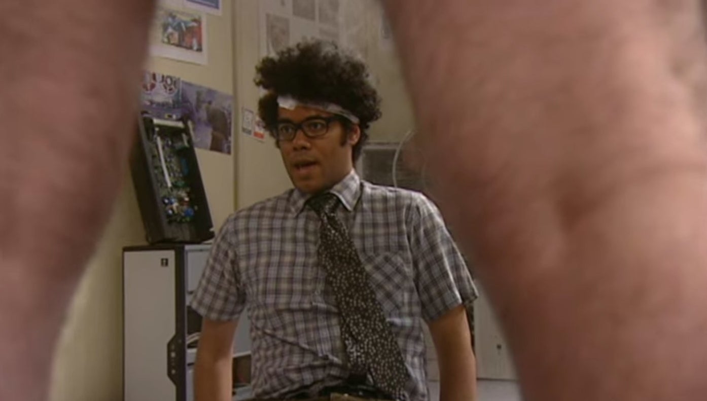 Moss sitting in front of a pantsless Douglas in &quot;The IT Crowd&quot;