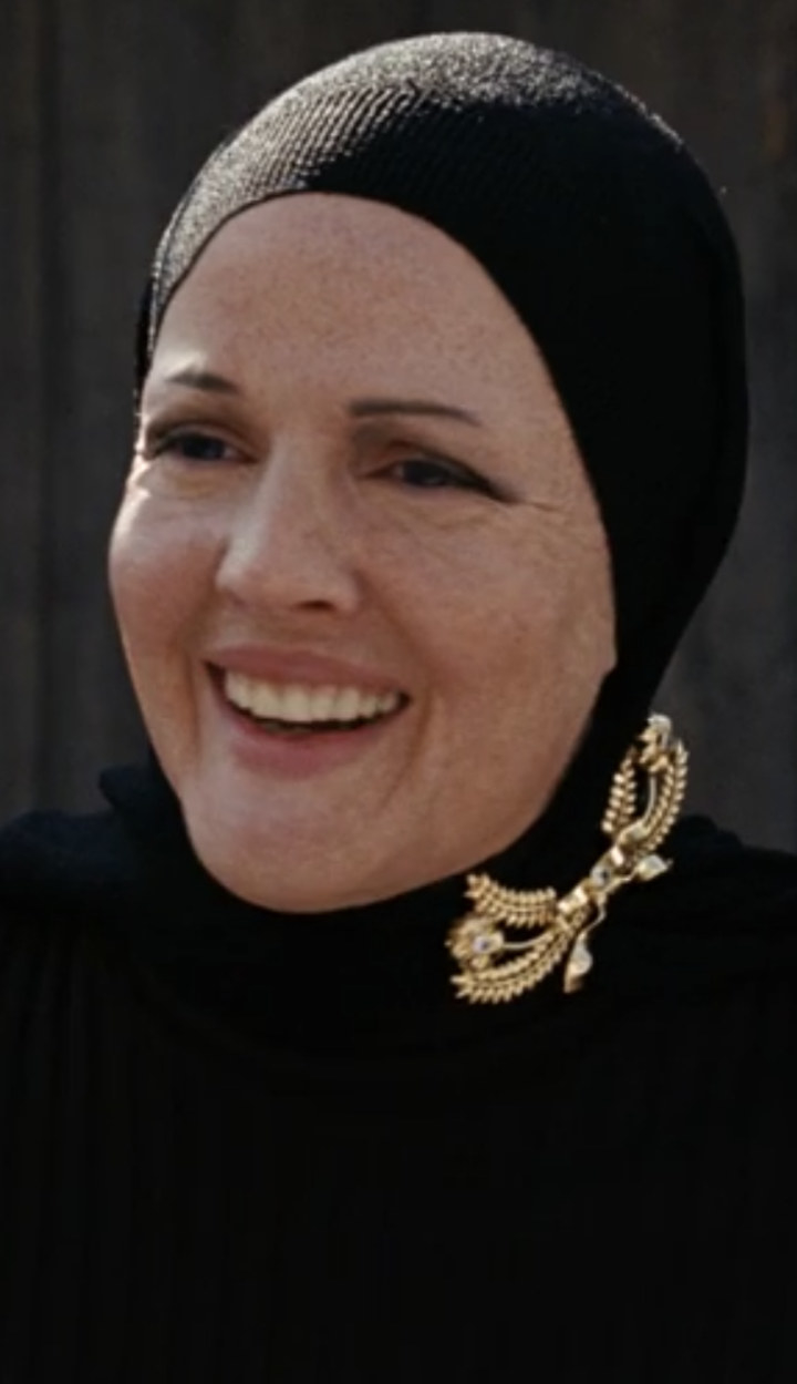 Barrymore with a black headscarf on