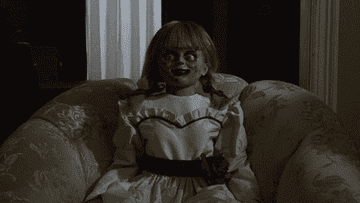 Annabelle doll in chair