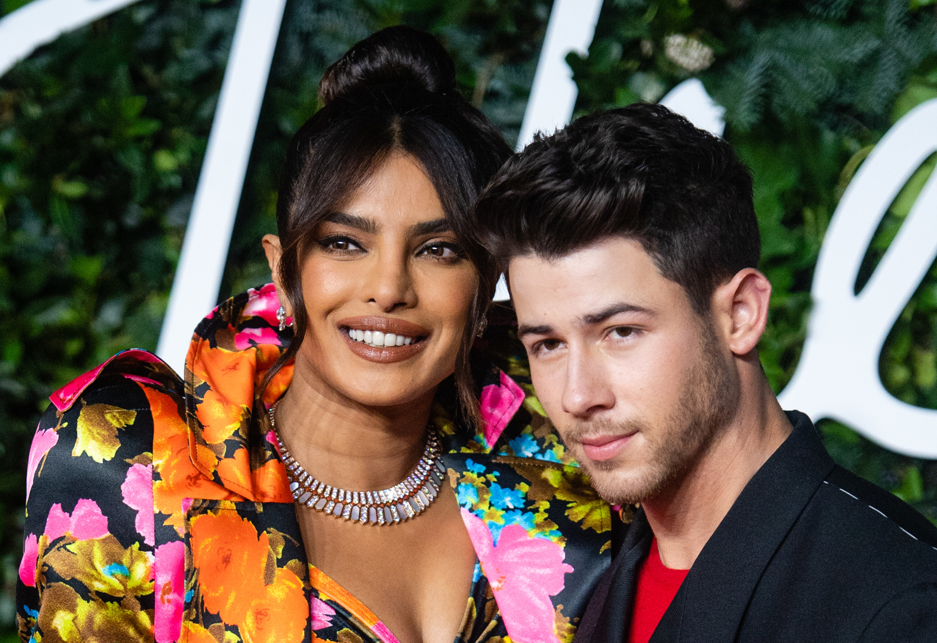 Priyanka Chopra and Nick Jonas pose at the Fashion Awards 2021 on November 29, 2021