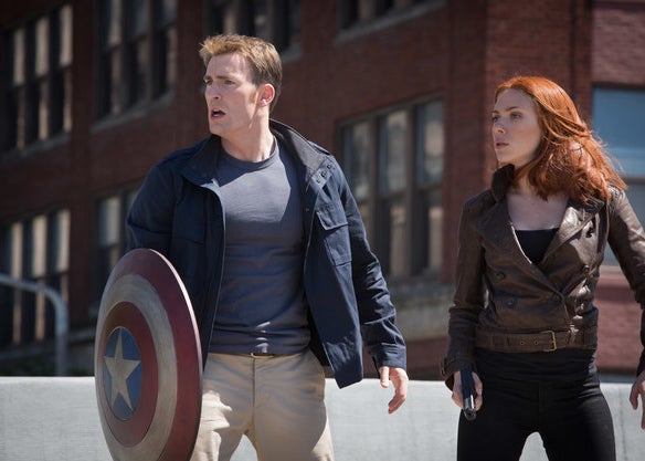 Steve Rogers and Natasha standing beside each other