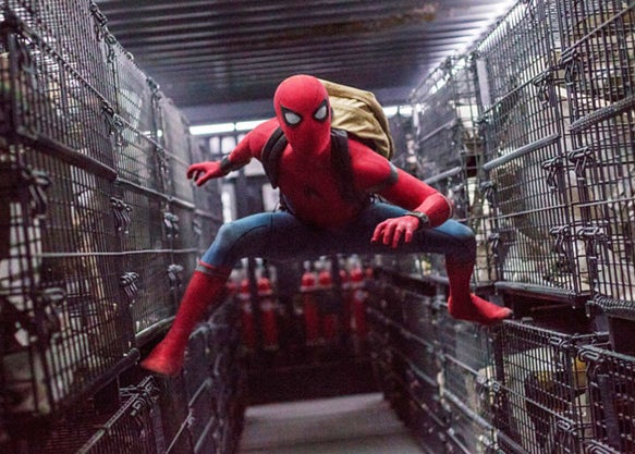 Spider-Man balancing on crates