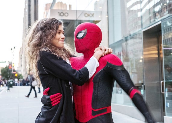 Peter Parker holding MJ