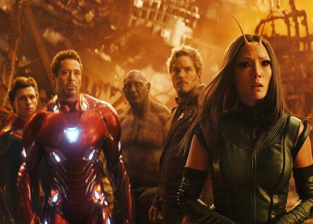 Peter Parker, Tony Stark, Drax, Quill, and Mantis looking at Thanos