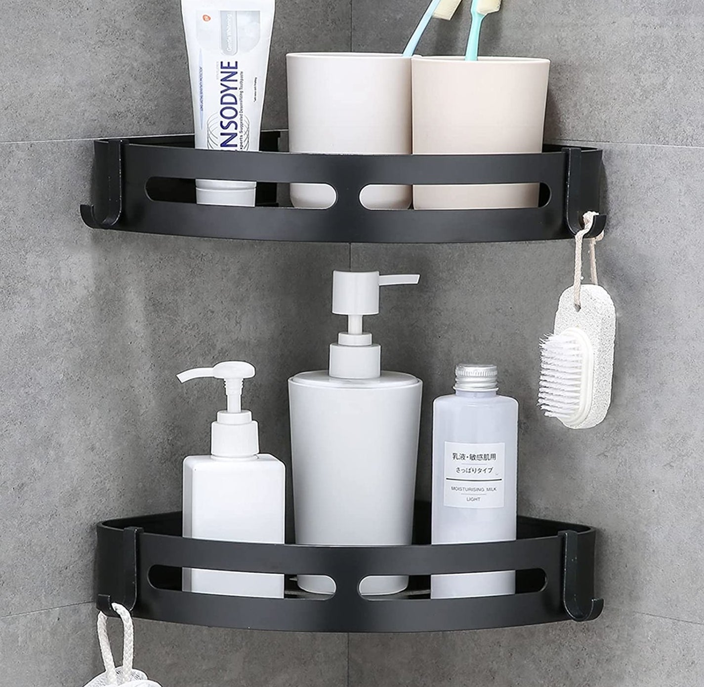 Two shelves in the corner of a shower with products on them