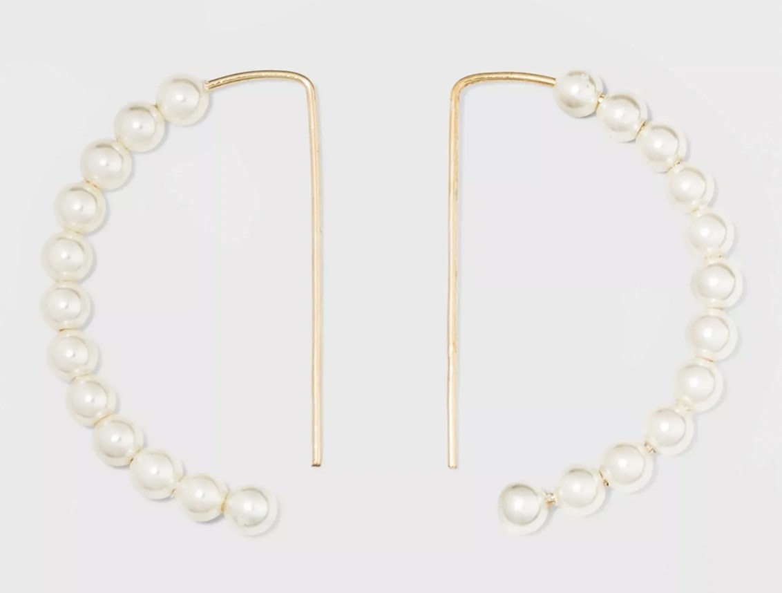 the pearl drop hoops with gold hardware