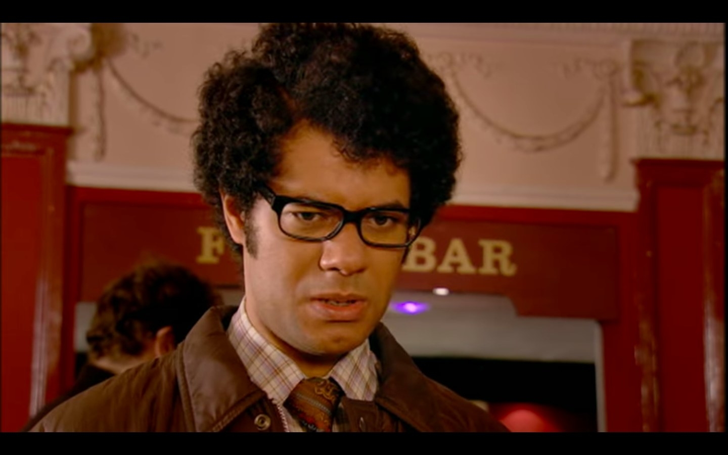 Moss looking disgusted at a theatre in &quot;The IT Crowd&quot;