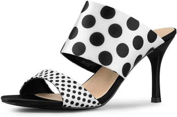 black and white stiletto mules with two straps, one with small and one with large polka dots