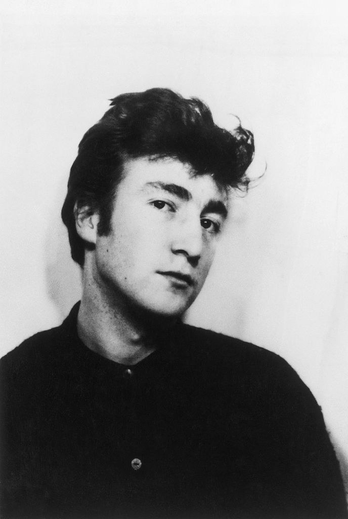 Lennon posing for a portrait in Liverpool in 1959