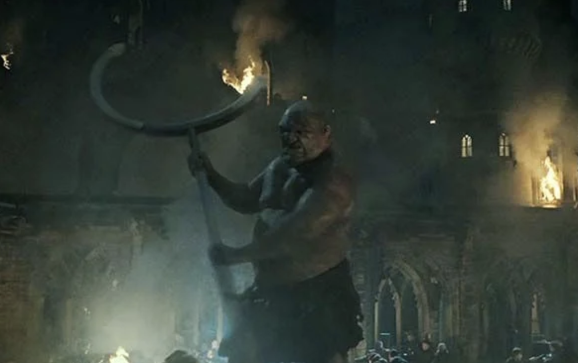 A giant using a Quidditch Goal Post as a weapon during the Battle of Hogwarts