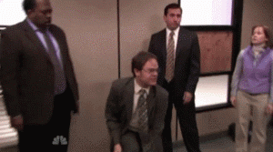 Dwight from The Office goes rogue during CPR training, cutting the face off the mannequin and wearing it to scare his coworkers