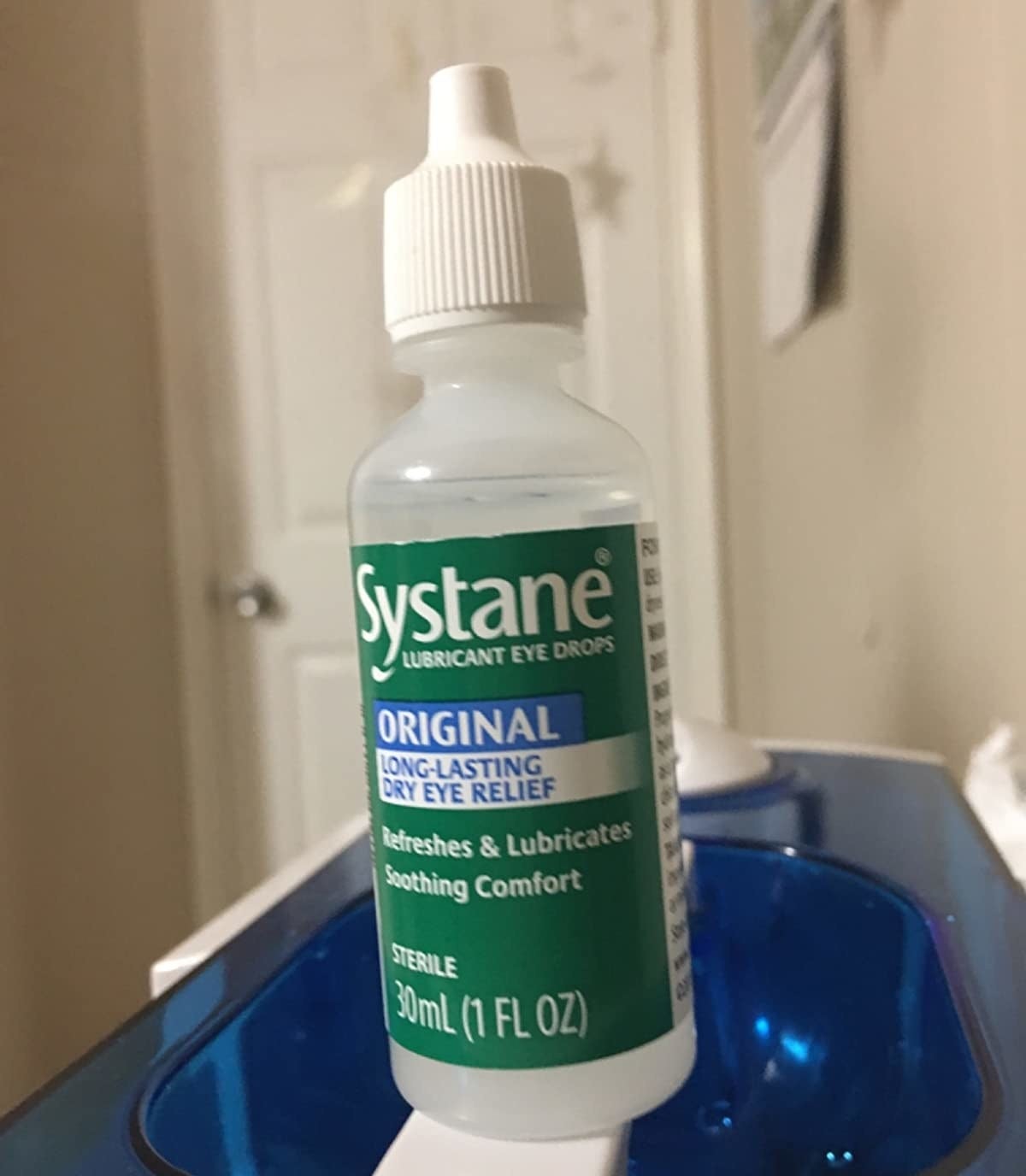 a reviewer photo of a bottle of eye drops
