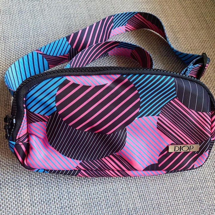 the pink, black, and blue fanny pack