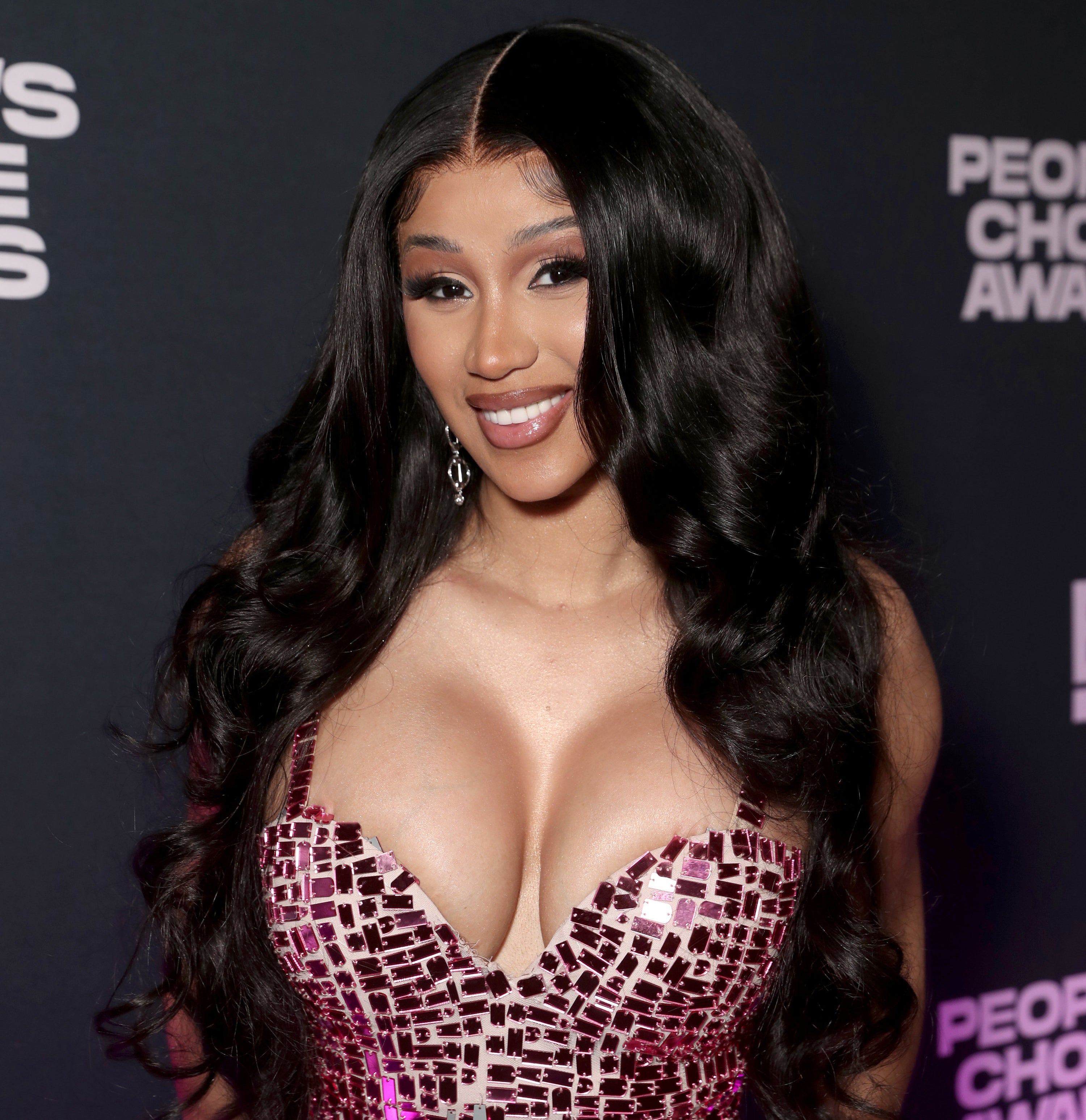 Cardi B poses backstage during the 2021 People's Choice Awards on December 7, 2021