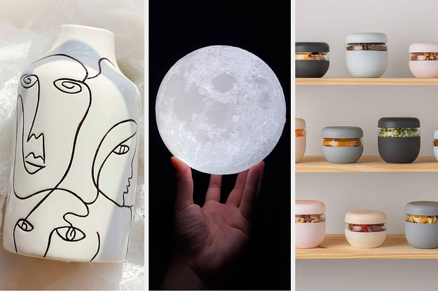 a white vase with face designs / a hand holding a lit globe light / colorful food storage containers arranged on three shelves