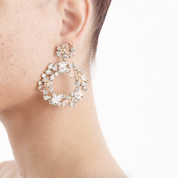 Image of model wearing crystal hoop earrings