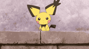 PIchu standing on a ledge tilting its head