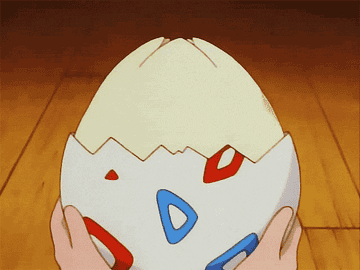 Togepi emerges from its shell yawning