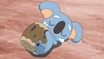 Komala sleeping and cuddling a stump