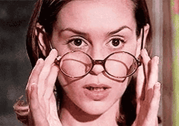 Miss. Honey from Matilda putting on glasses
