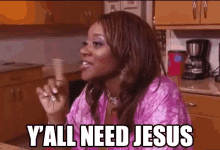 GIF of a woman shaking her head with the subtitle &quot;Y&#x27;all need Jesus&quot;