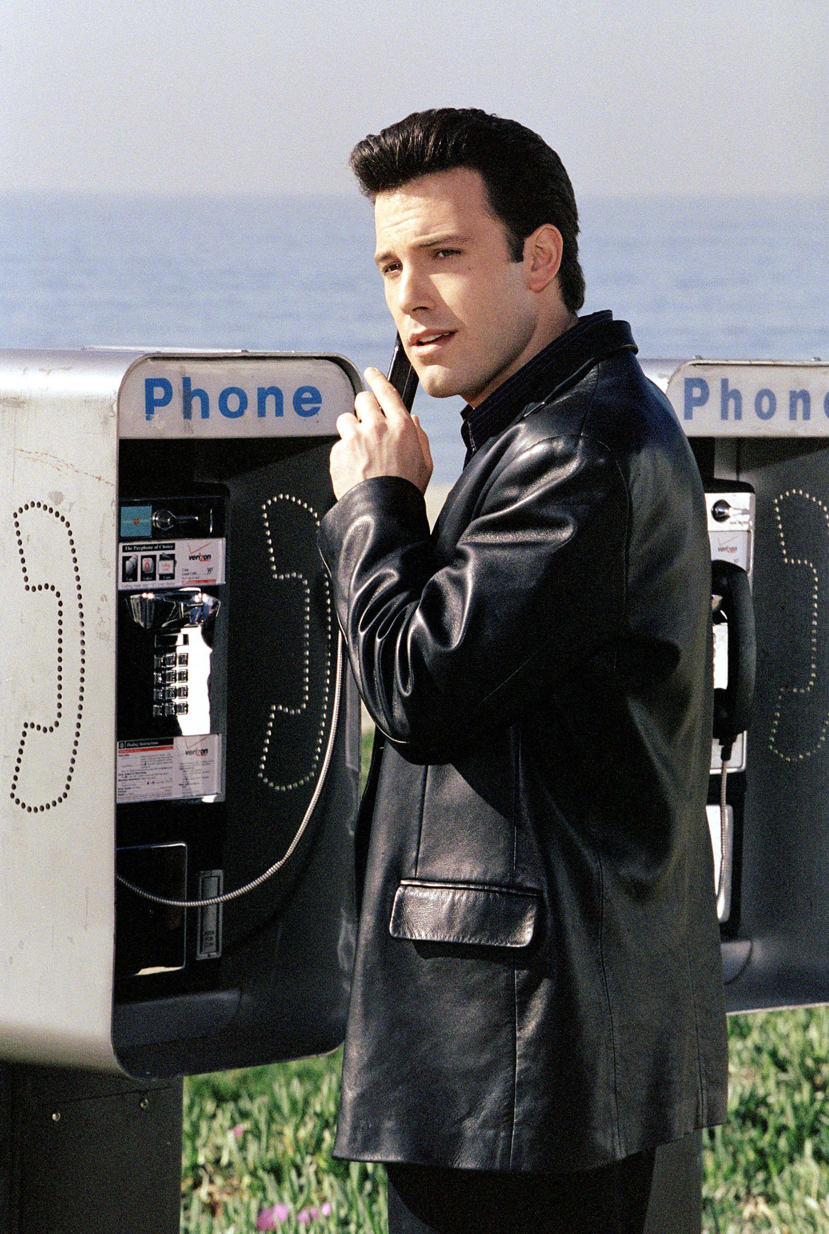 Affleck uses a pay phone