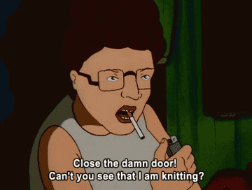 Peggy Hill hiding in a closet with a cigarette and a lighter saying &quot;close the damn door, can&#x27;t you see that i am knitting?&quot;