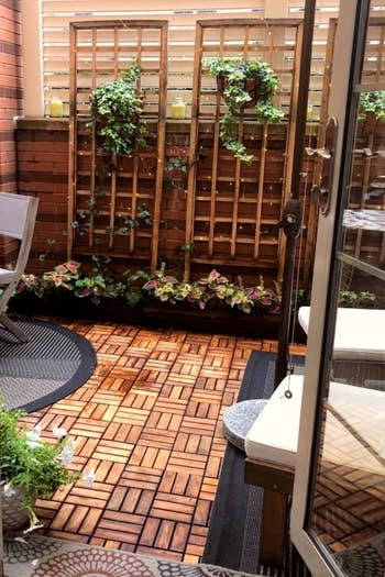 Backyard patio covered with the tiles