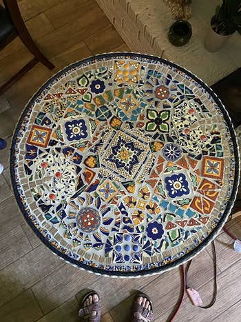 reviewer's table re-created with a mosaic tile design